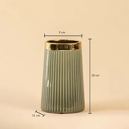 Ribbed green ceramic vase with golden rim shown with visible measurements of 18 cm height 11 cm base width and 9 cm top diameter for clear size reference.