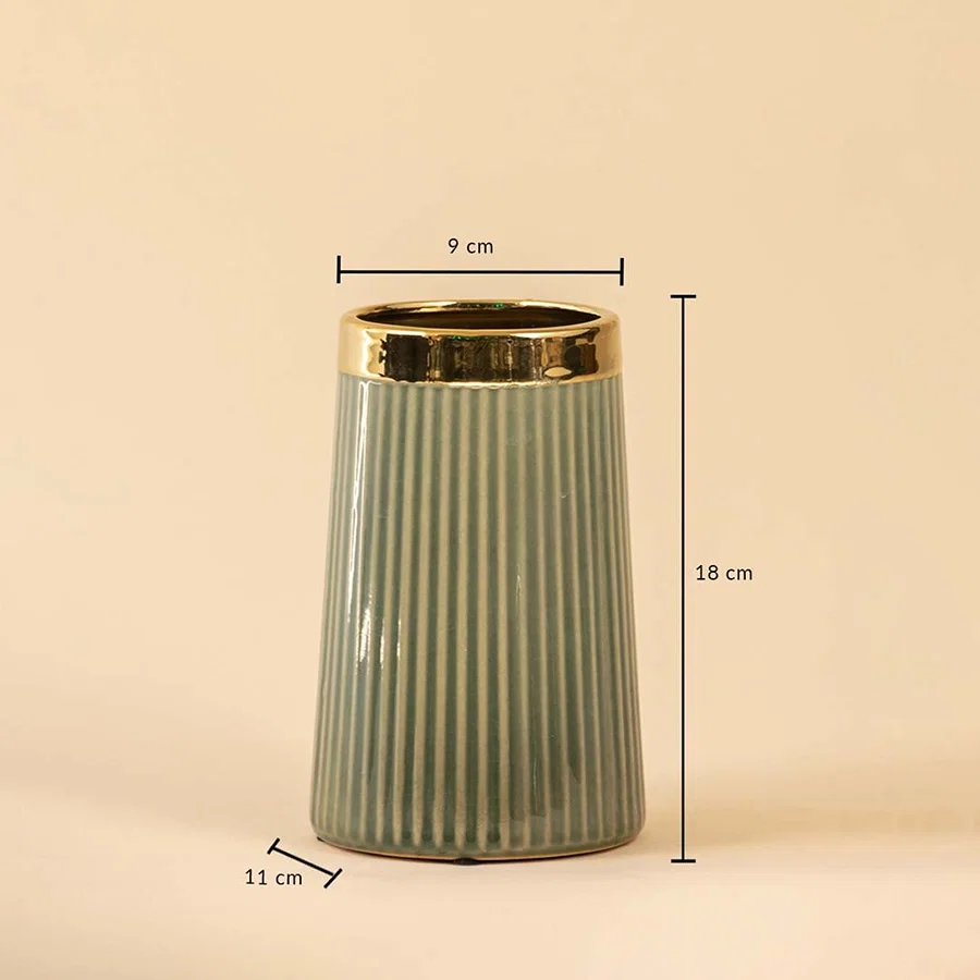 Dimension image of a tapered sage green ceramic vase with a vertical ribbed pattern and a shiny metallic gold rim 25 cm height and 9 cm width.