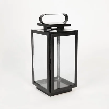 White background image of medium metal tower lantern for elegant outdoor decor styling with classic vintage design.