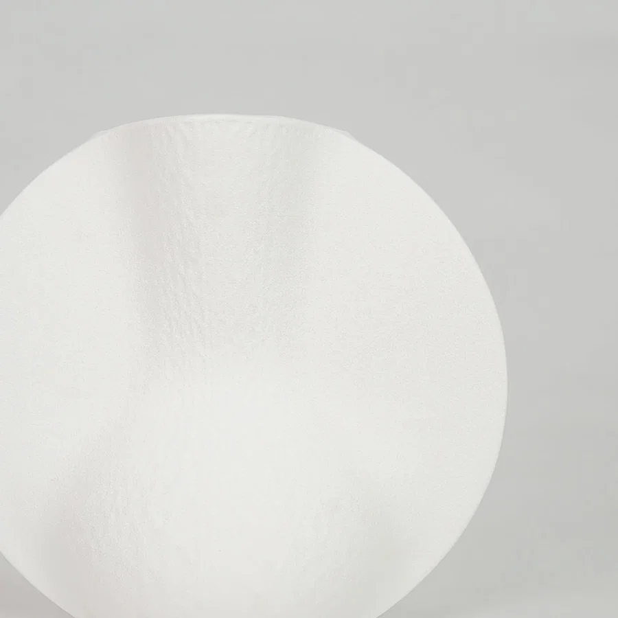 Closeup image of white ceramic modern vase for elegant tabletop decor styling with smooth matte finish display.