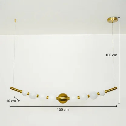 Modern linear pendant light with white glass globes and gold accents suspended on cable 100 cm width 100 cm height 10 cm depth ideal for dining or kitchen lighting.