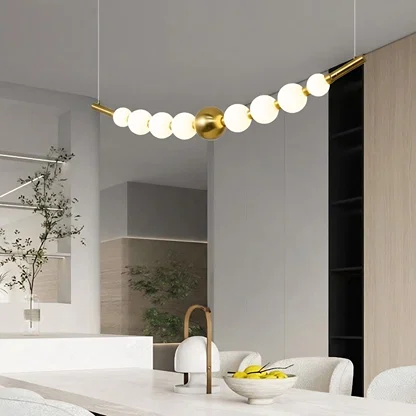 Contemporary wall light with ribbed glass shades installed above sink area in modern bathroom creating soft ambient lighting.

