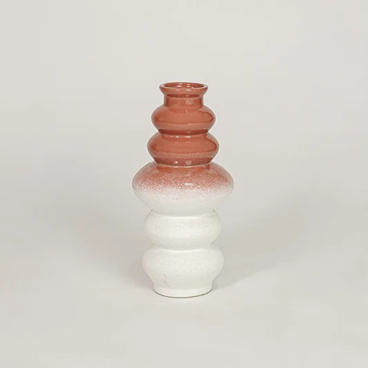 Stacked ceramic vase with terracotta and white ombre finish for artistic home decor and modern shelf centerpiece.