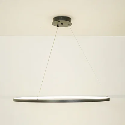 Minimal black linear pendant light with sleek design suspended by thin cables against white ceiling background perfect for modern interiors.