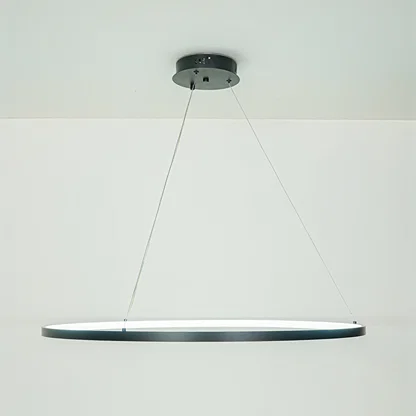 Elegant modern linear pendant light with slim profile hanging against neutral ceiling background ideal for contemporary dining or kitchen lighting.

