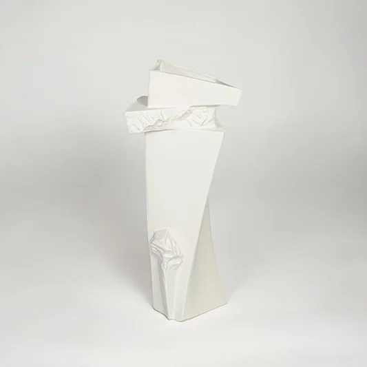 Contemporary white ceramic tall decor vase with textured accents for minimalist living room styling.