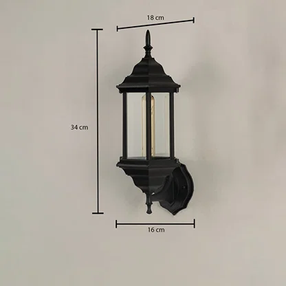Black outdoor lantern showing 41 cm height 26 cm width and 18 cm depth with raindrop glass and curved arm design clearly displayed.