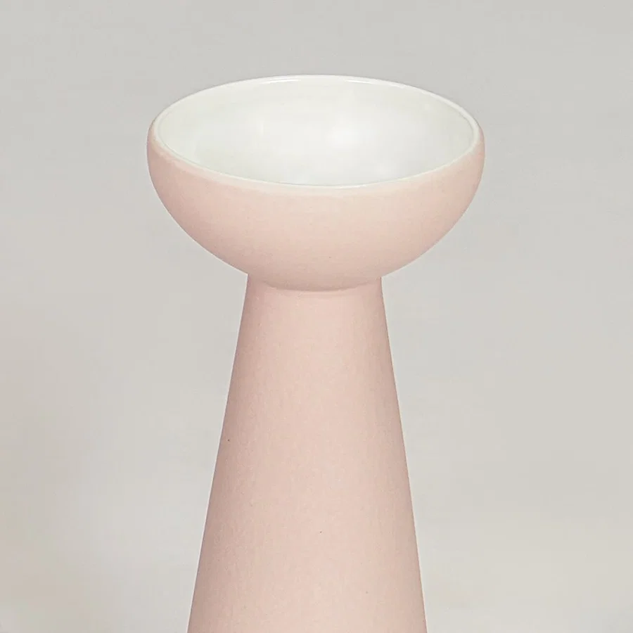 Pink ceramic flower vase closeup modern decorative tabletop vase for living room shelf console decor styling.
