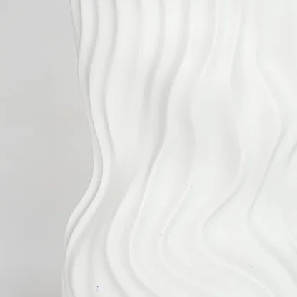 Closeup white textured ceramic vase surface detail modern decorative flower vase for table shelf console decor.