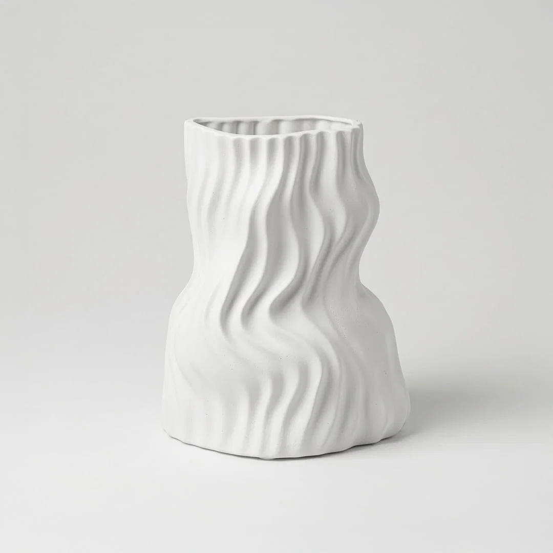 Modern white decorative flower vase isolated clean background stylish ceramic vase for home decor accent.