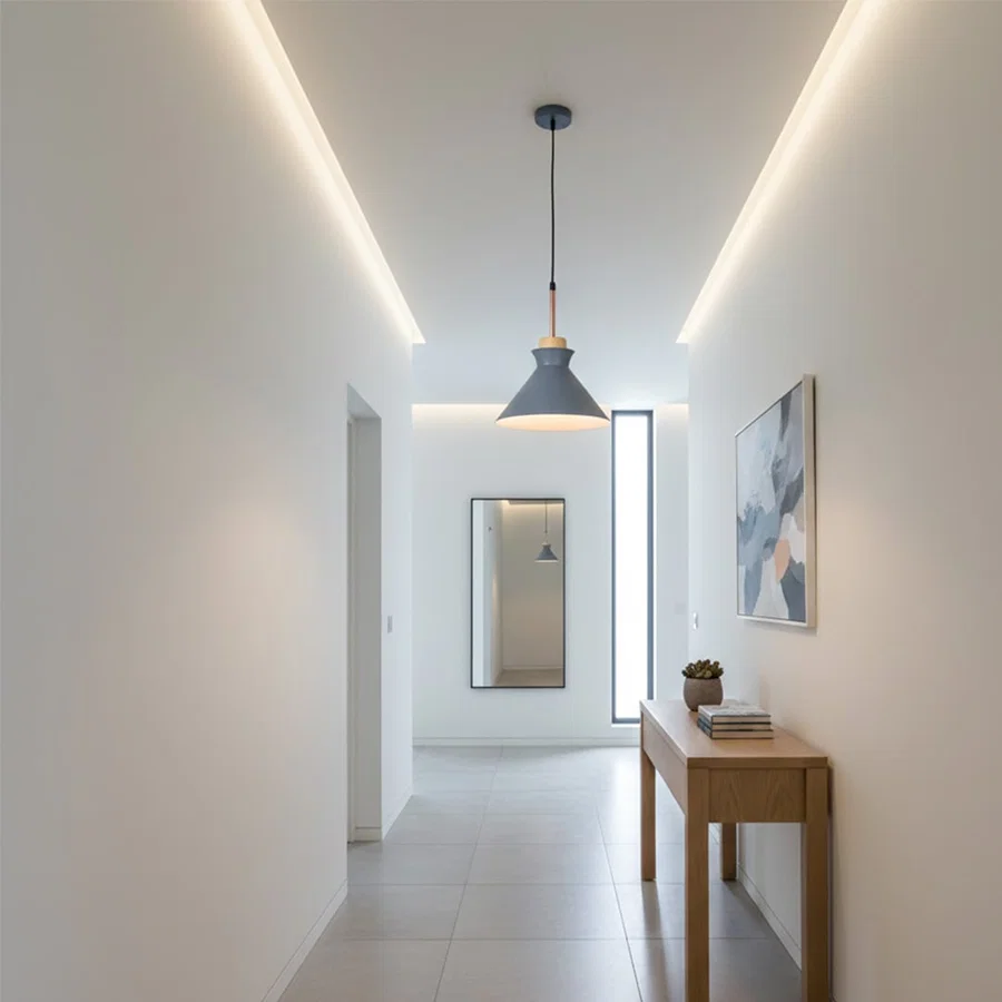 Blue metal pendant light in hallway adding Scandinavian elegance and warm ambient lighting to modern interiors.
