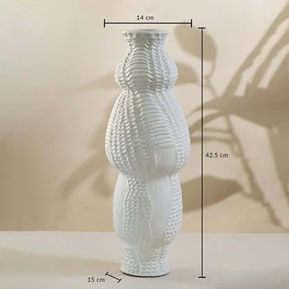 White ceramic vase with textured surface on white background showing height 42 cm width 14 cm and base 15 cm suitable for elegant home styling.