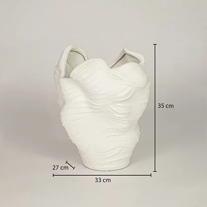 Dimension image of matte white textured organic sculpture vase with wavy folds showing 35 cm height and 33 cm width.