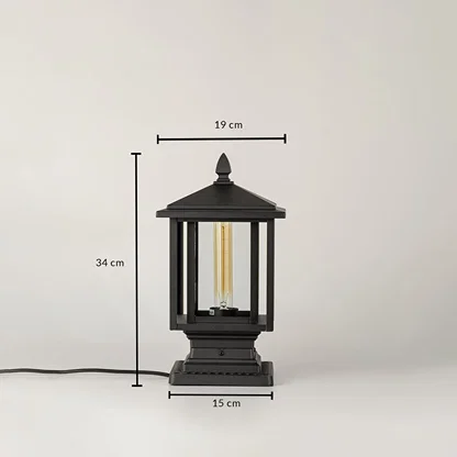 Black outdoor lantern light Dimensions Image 34 cm height by 17 cm top width by 15 cm base width.