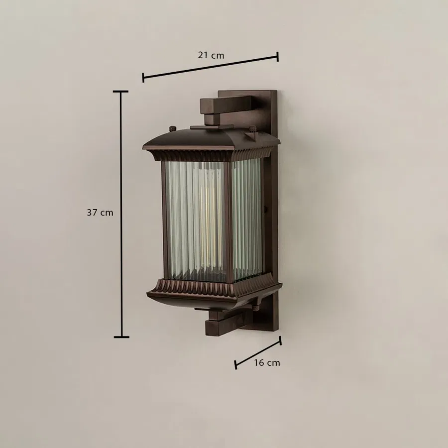 A bronze outdoor wall lantern with ribbed glass shown with dimensions clearly marked as 37 cm height 21 cm width and 16 cm depth against a plain background.