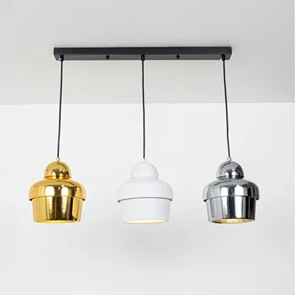 Gold white and chrome metal pendant lights showcasing stylish designs for contemporary home decor.
