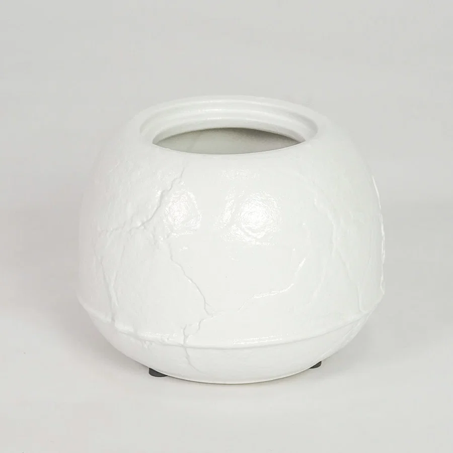 White ceramic planter pot for modern console table placement and stylish indoor decor styling accent display piece.