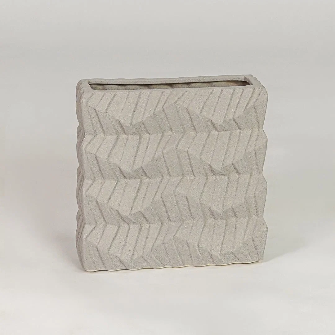 Beige ceramic decorative vase with textured finish modern flower vase for shelf console table decor styling.