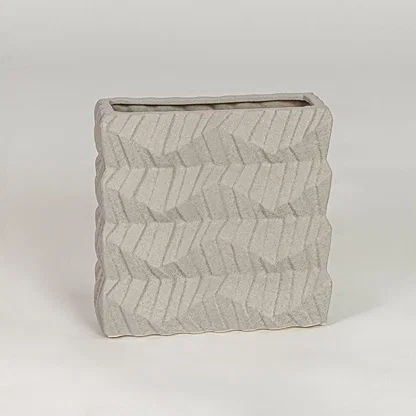 Beige ceramic decorative vase with textured finish modern flower vase for shelf console table decor styling.