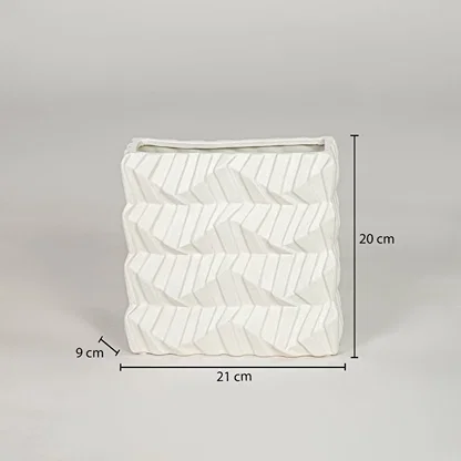 White ceramic decorative vase size 23 cm height 21 cm width 9 cm depth modern flower vase for table console styling.