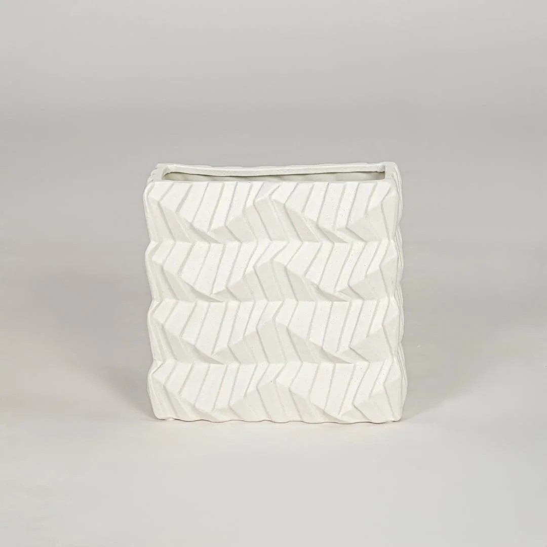 White ceramic decorative vase with textured pattern modern flower vase for tabletop shelf console living room decor styling.