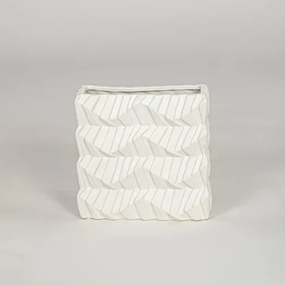 White ceramic decorative vase with textured pattern modern flower vase for tabletop shelf console living room decor styling.