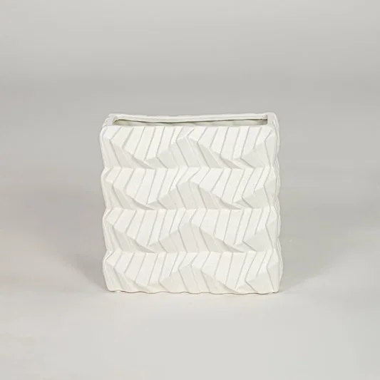 White ceramic decorative vase with textured pattern modern flower vase for tabletop shelf console living room decor styling.