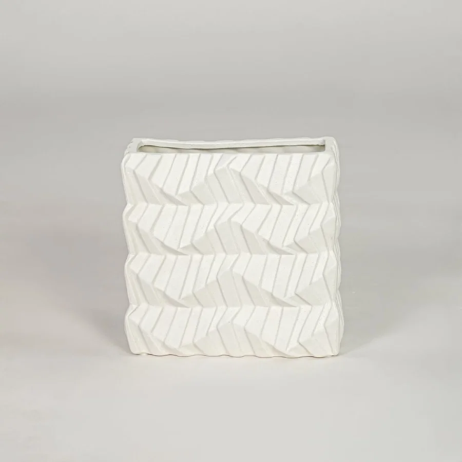 White ceramic decorative vase with textured pattern modern flower vase for tabletop shelf console living room decor styling.