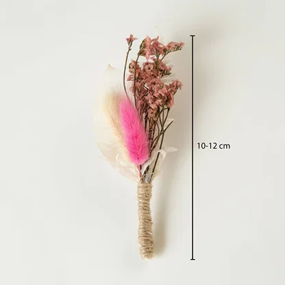 Dried floral bunch with pink accent feather showing height 10 to 12 cm ideal for small vase styling and natural home Decor.