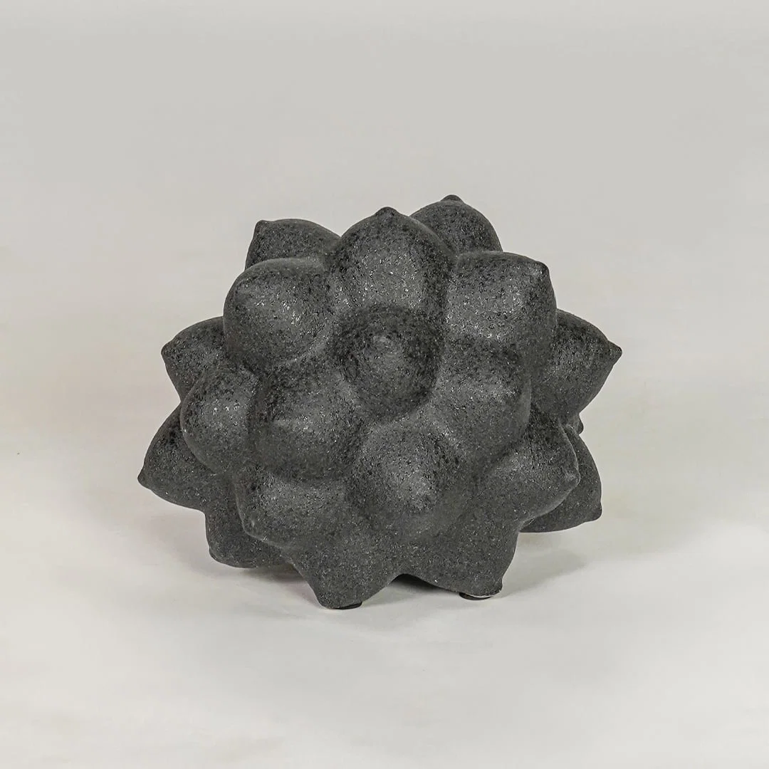 Black ceramic decor sculpture with textured design modern showpiece for table console shelf home decor styling.