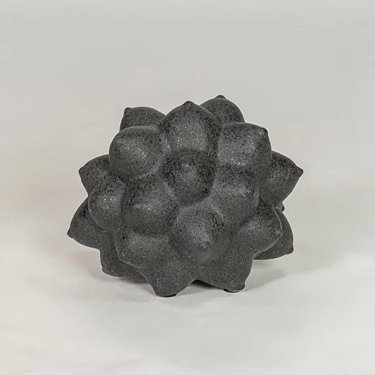 Black ceramic decor sculpture with textured design modern showpiece for table console shelf home decor styling.