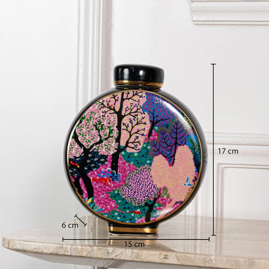 Decorative ceramic jar measuring 17 cm height 15 cm width and 6 cm base depth suitable for tabletop decor placement.