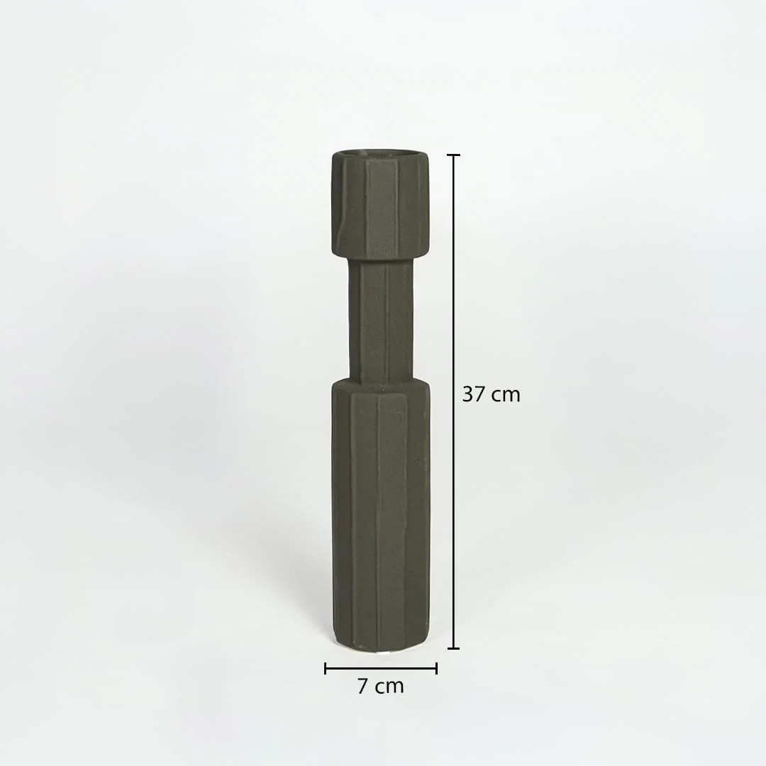 Black metal decorative candle holder measuring 37 cm height and 7 cm width ideal for modern tabletop decor styling.