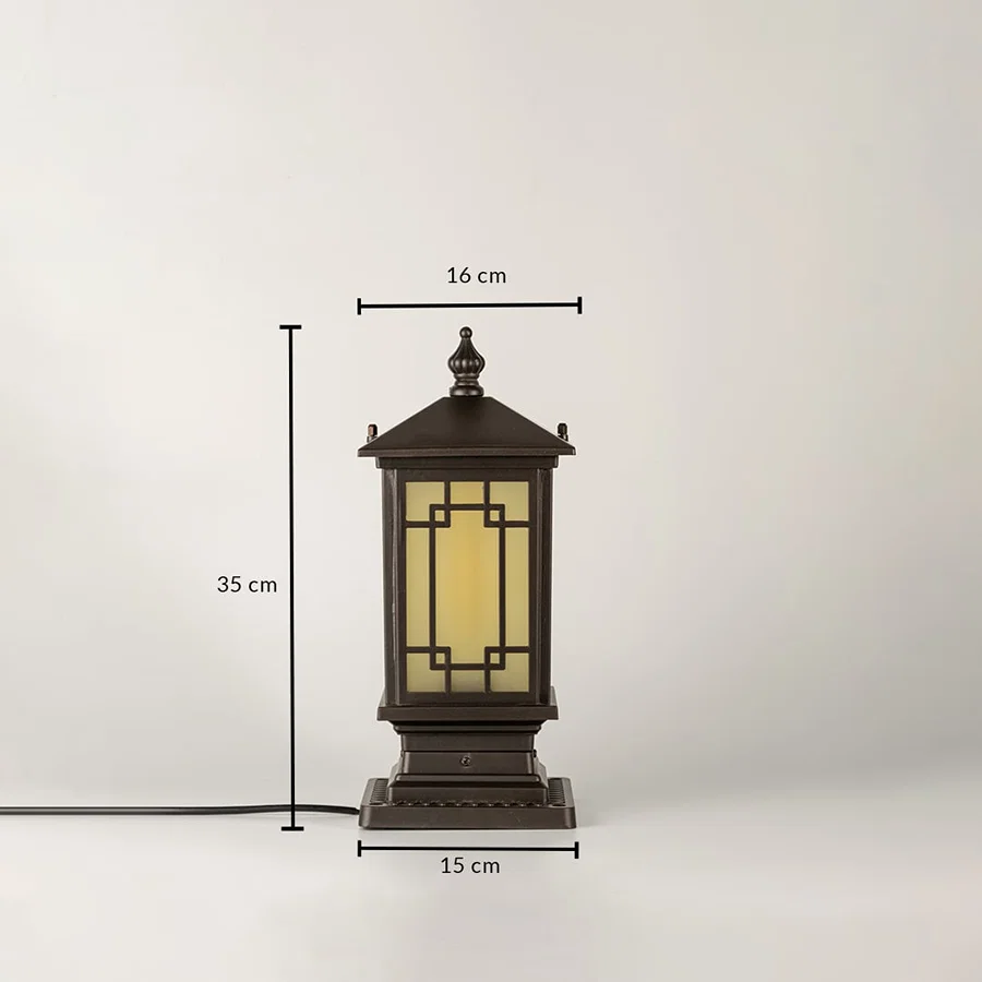 Black traditional post lantern Dimensions Image $34 \text{ cm}$ height $17 \text{ cm}$ top width $15 \text{ cm}$ base width.