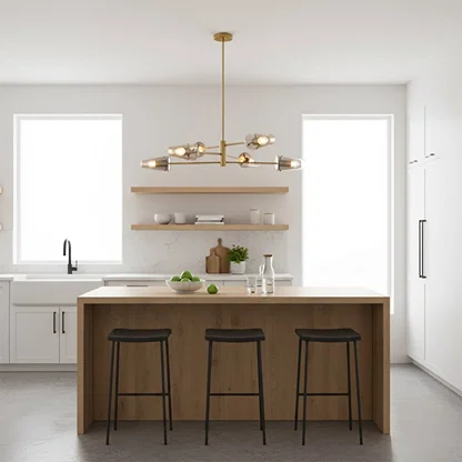 Gold metal linear pendant light installed above kitchen island adding warm illumination sleek style and modern interior Decor appeal.