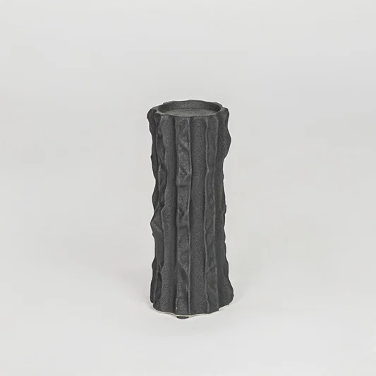 Modern black decorative candle holder isolated clean background stylish ceramic candle stand for home decor accent.