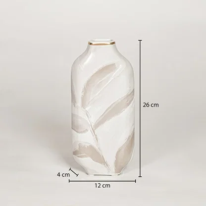 White ceramic decorative vase showing 12 cm width 4 cm depth and 26 cm height ideal for console table decor display.