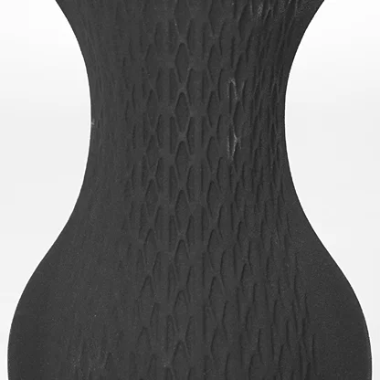 Closeup image of black ceramic textured vase for luxury console table decor styling with elegant matte finish.